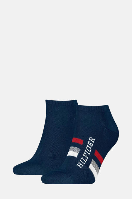 Blauwe sokken van TOMMY JEANS, met logo en streepdetails.
