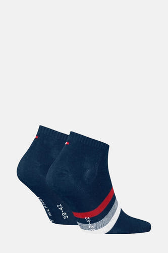 Chaussettes bleues de TOMMY JEANS, avec des rayures rouges et blanches et un détail de logo.