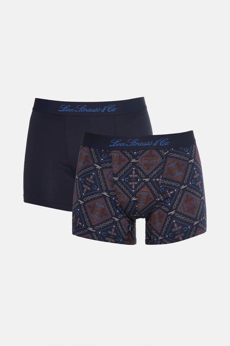 Shorts de bain bleus de Levi's® Accessories, un uni et un avec un motif à la paisley.