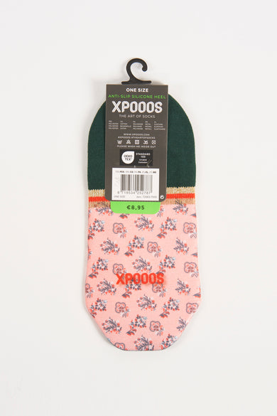 Multicolor sokken met roze bloemenprint en donkergroene bovenrand van XPOOOS, voorzien van siliconen zool en oranje logo op de voet.