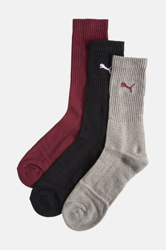 Multikleurige sokken van PUMA, met ribbels en geborduurd logo in rood, zwart en grijs.