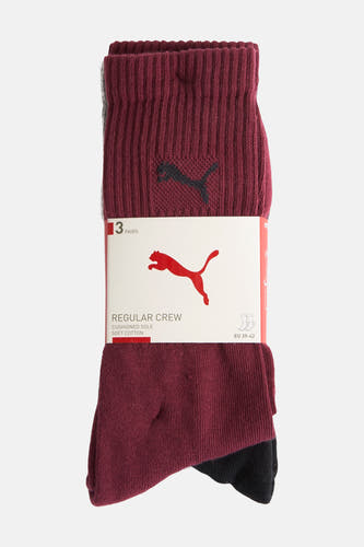 Multi-color sokken van PUMA, met een ribbeltextuur en een verpakking met het PUMA-logo.