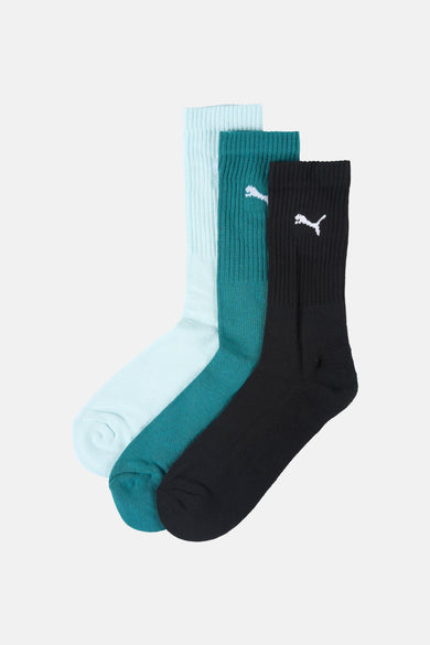 Chaussettes multicolores de PUMA, avec un logo blanc imprimé sur l'une des chaussettes.