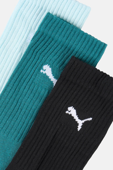 Chaussettes multicolores PUMA avec texture côtelée et un détail de logo blanc.