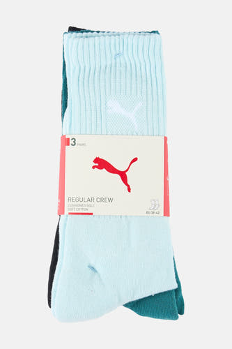 Chaussettes multicolores de PUMA, avec une texture côtelée et un logo rouge sur l'emballage.