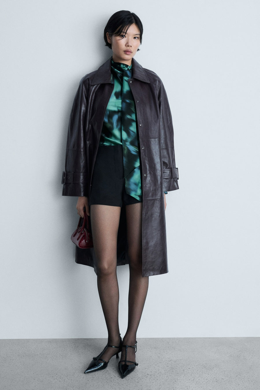 Multikleurige blouse met lange mouwen van MANGO, met abstract groen en blauw patroon.