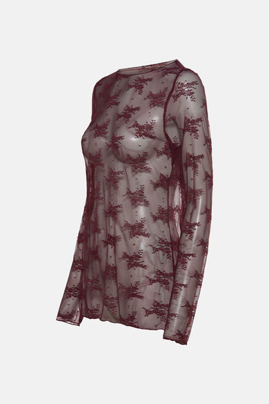 Blouse de Bordeaux à longues manches de Terra di Siena, avec un motif imprimé floral.