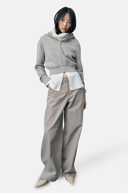 Beige gekleurde broek van MANGO, met wijde pijpen en een ritssluiting.