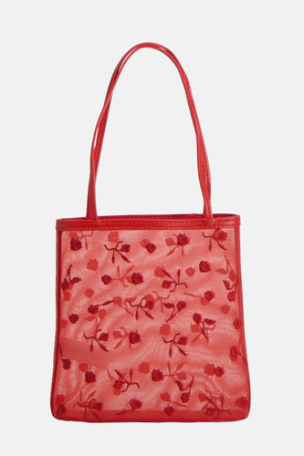 Rode handtas van MANGO met een bloemenpatroon en doorzichtige gaasdetails.
