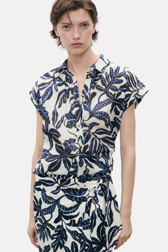 Multikleurige rok van MANGO, met een bladmotief en een geknoopte taille.