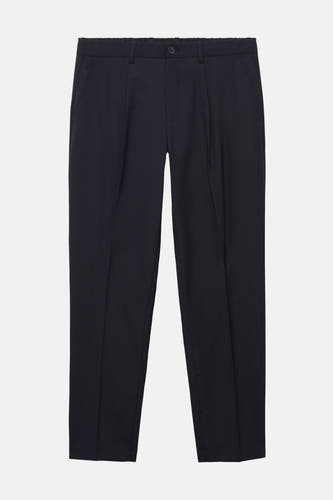 Pantalon de costume bleu MANGO, avec des plis et une fermeture à bouton.
