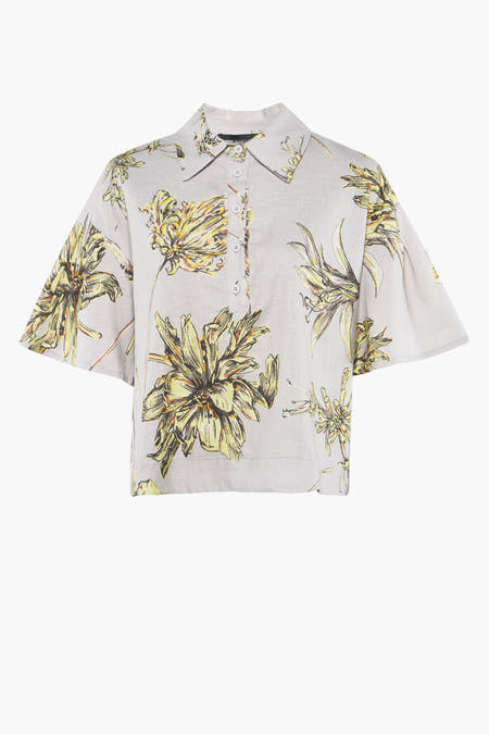Multikleurige blouse van Astrid Black Label met korte mouwen en bloemenprint.
