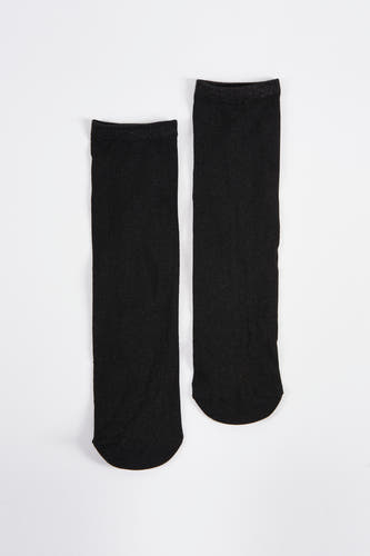 Zwarte sokken van Astrid Black Label, met glitters op de rand, liggend op een witte achtergrond.
