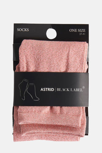 Chaussettes roses d'Astrid Black Label, avec un effet pailleté dans un emballage.