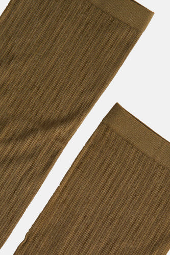 Groene sokken van Astrid Black Label, met een geribbelde textuur en een effen kleur.