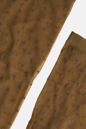 Chaussettes vertes d'Astrid Black Label, avec un motif de points subtil et une texture finement tissée.