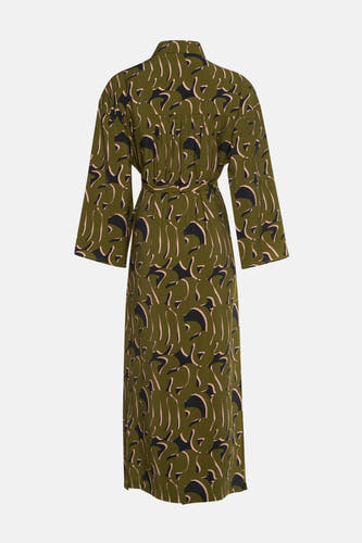 Groene jurk met lange mouwen van Astrid Black Label, met een abstract patroon in roze en zwart.
