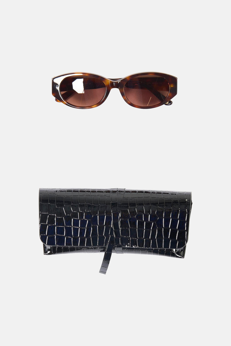 Bruine bril van Astrid Black Label met een zonnebril-montuur.