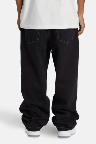 Zwarte wijde jeans van denim van DC SHOES, met witte stiksels en losse pasvorm.
