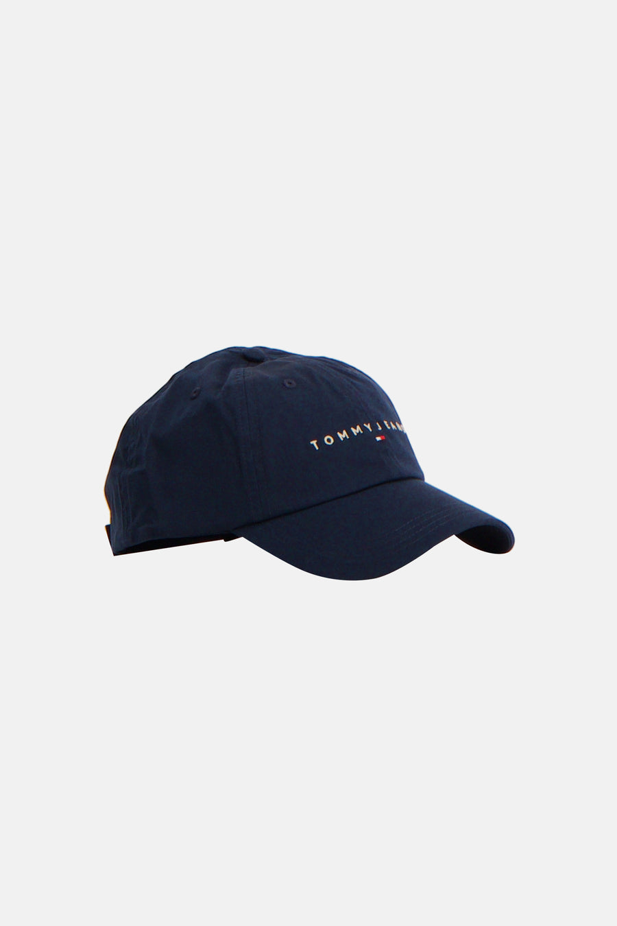 Casquette bleue de TOMMY JEANS avec logo brodé sur l'avant, en vue latérale.