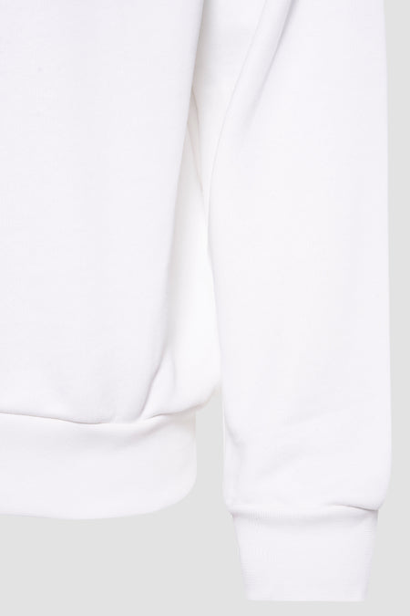 Witte sweater van KAOTIKO, met lange mouwen en een geribbelde zoom.