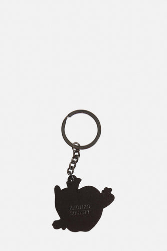 Sleutelhanger met de tekst 'Kaotiko Society'.