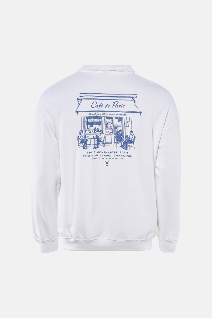 Witte sweater van KAOTIKO met een blauwe print van een Parijs café op de achterkant.
