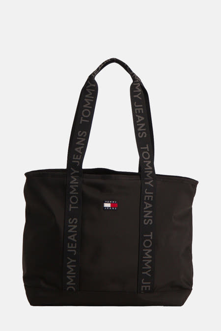 Zwarte handtas van TOMMY JEANS met logobandjes en klein logo aan de voorkant.