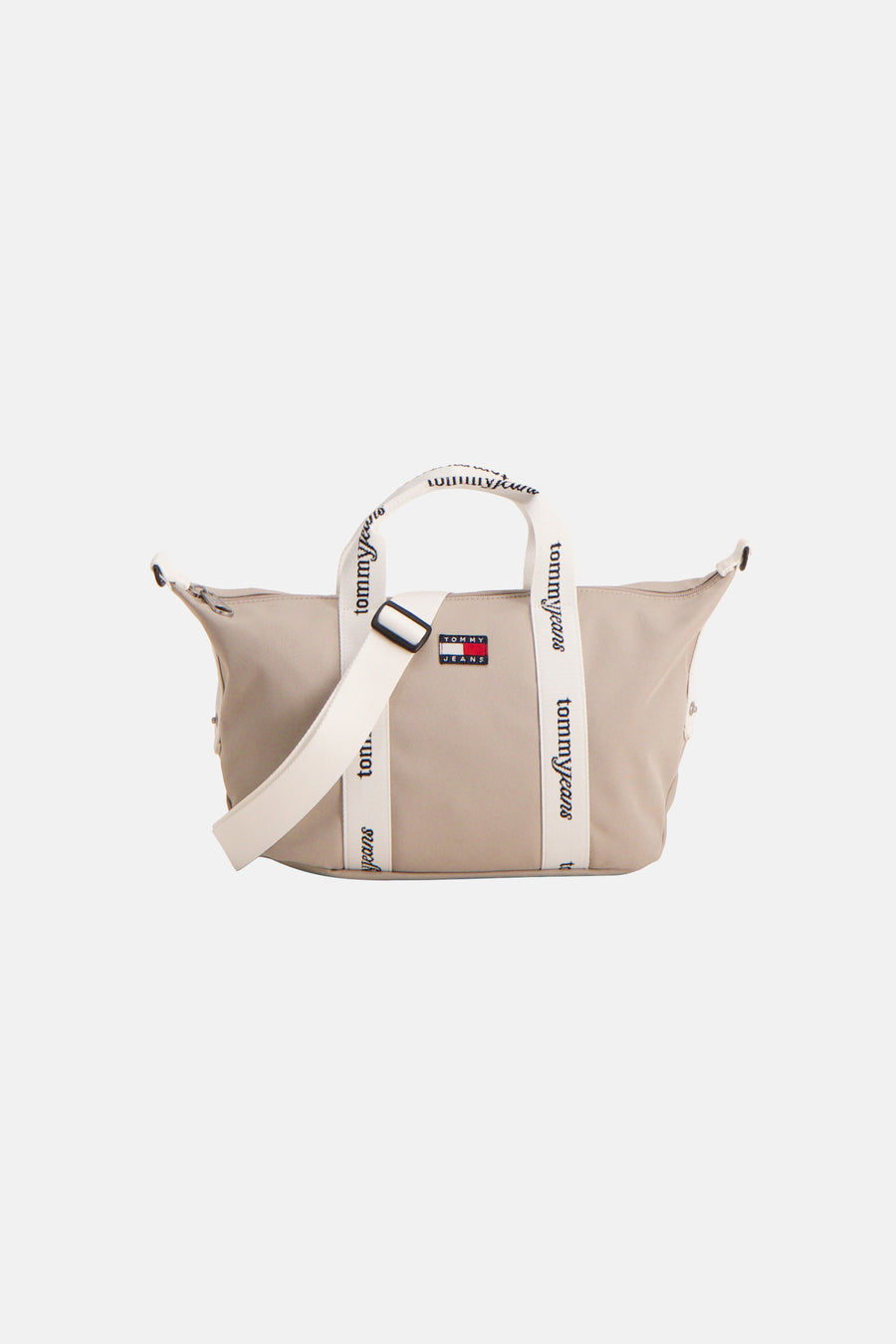 Beige schoudertas van TOMMY JEANS, met witte banden voorzien van logo en een verstelbare schouderriem.
