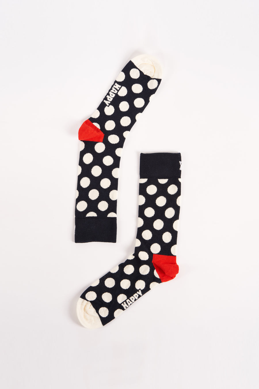 Blauwe sokken van Happy Socks met witte stippen en rode details.