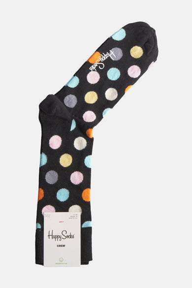 Multikleurige sokken van Happy Socks, met een stippenpatroon in verschillende kleuren.
