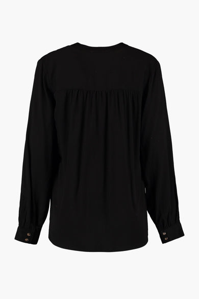 Zwarte blouse met lange mouwen van HAILYS, rugzijde met ruches en knopen aan de polsen