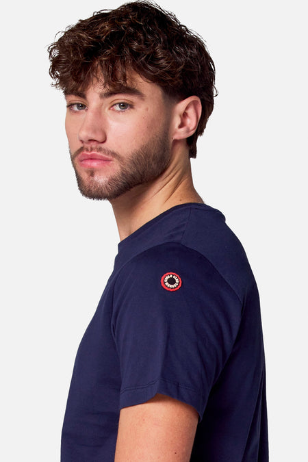 Blauw T-shirt met korte mouwen van Cyclo Club Marcel, met ronde hals en logo op de mouw.

