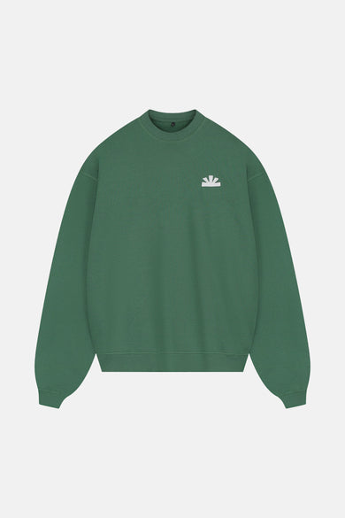 Groene sweater van BASELAB, met een klein wit logo op de borst.
