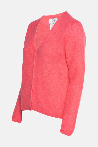 Gilet rose de Clouds of Fashion, avec fermeture à boutons et une douce texture tricotée.