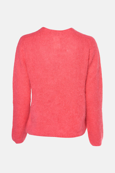 Gilet rose de Clouds of Fashion, avec des manches longues et une douce texture tricotée.