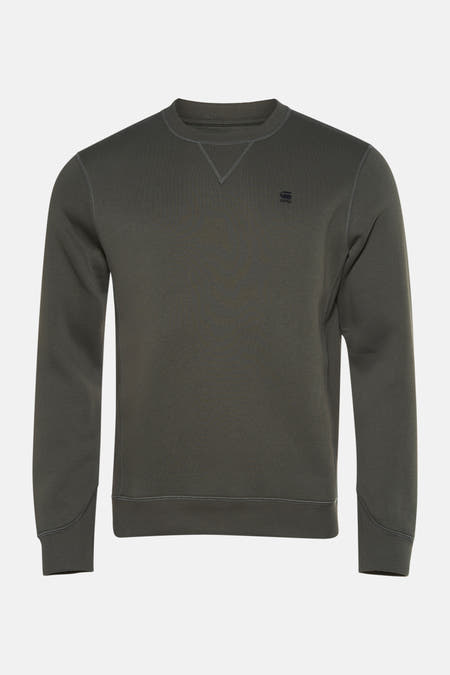 Sweater vert de G-Star RAW, avec une petite bordure de logo sur la poitrine et des points décoratifs.