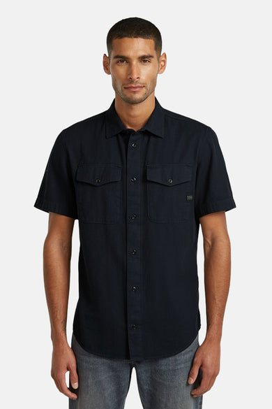 Chemise bleue à manches courtes de G-Star RAW, avec une texture subtile et un col classique, vue de dos.