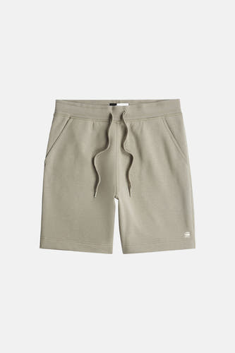 Short gris G-Star RAW avec cordon de serrage, poches latérales et logo blanc sur la jambe gauche.