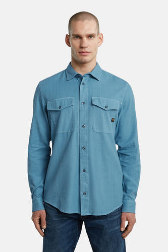 Blauw overhemd met lange mouwen van G-Star RAW, met twee borstzakken en een knoopsluiting.