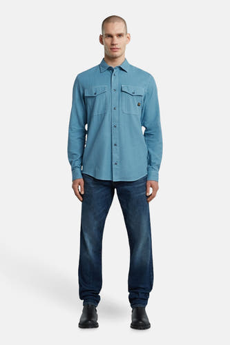 Blauw hemd met lange mouwen van G-Star RAW, met knoopsluiting, borstzakken en donkerblauwe jeans.