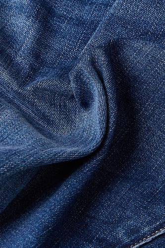 Jeans slim fit en denim bleu de G-Star RAW, avec une texture froissée.