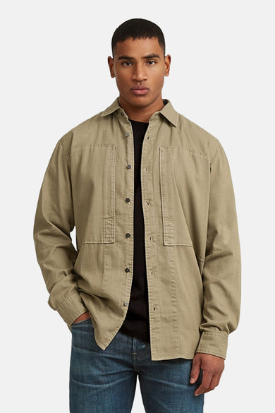 Chemise beige de G-Star RAW, à manches longues et avec un logo de marque sur le col, vue de dos.