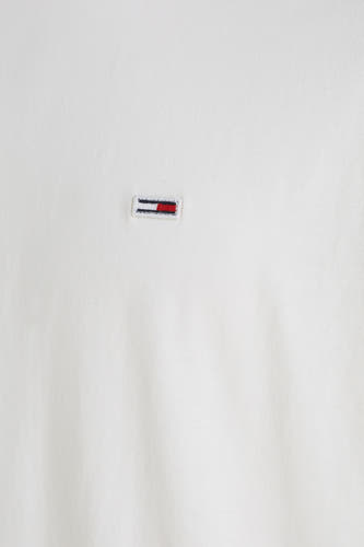 T-shirt blanc de TOMMY JEANS, avec un petit logo sur la poitrine.