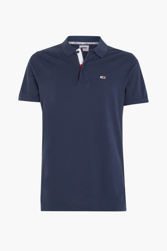 T-shirt bleu de TOMMY JEANS, avec des manches courtes et un logo sur la poitrine.