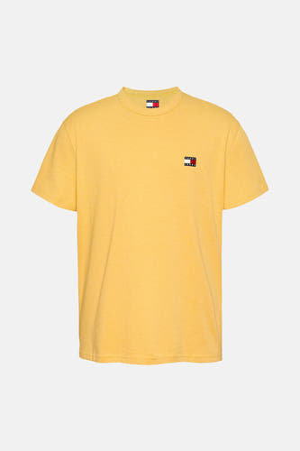 T-shirt jaune à manches courtes de TOMMY JEANS, avec le logo sur la poitrine.