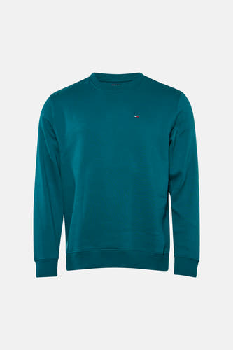 Groene ronde hals sweater van TOMMY JEANS met klein logo op borst, ribboorden aan kraag en mouwen, front view