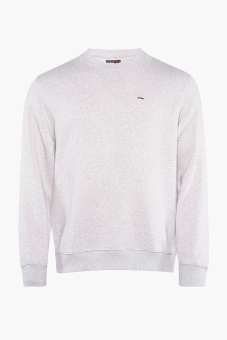 Grijze sweater van TOMMY JEANS, met een klein logo op de borst.