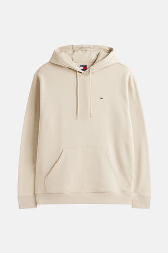 Hoodie beige de TOMMY JEANS, avec poche kangourou et cordons.