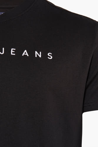 Zwart T-shirt met korte mouwen van TOMMY JEANS, met witte 'JEANS'-belettering op de borst.